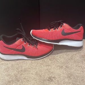 Hot pink and black Nike shoes size 6.5